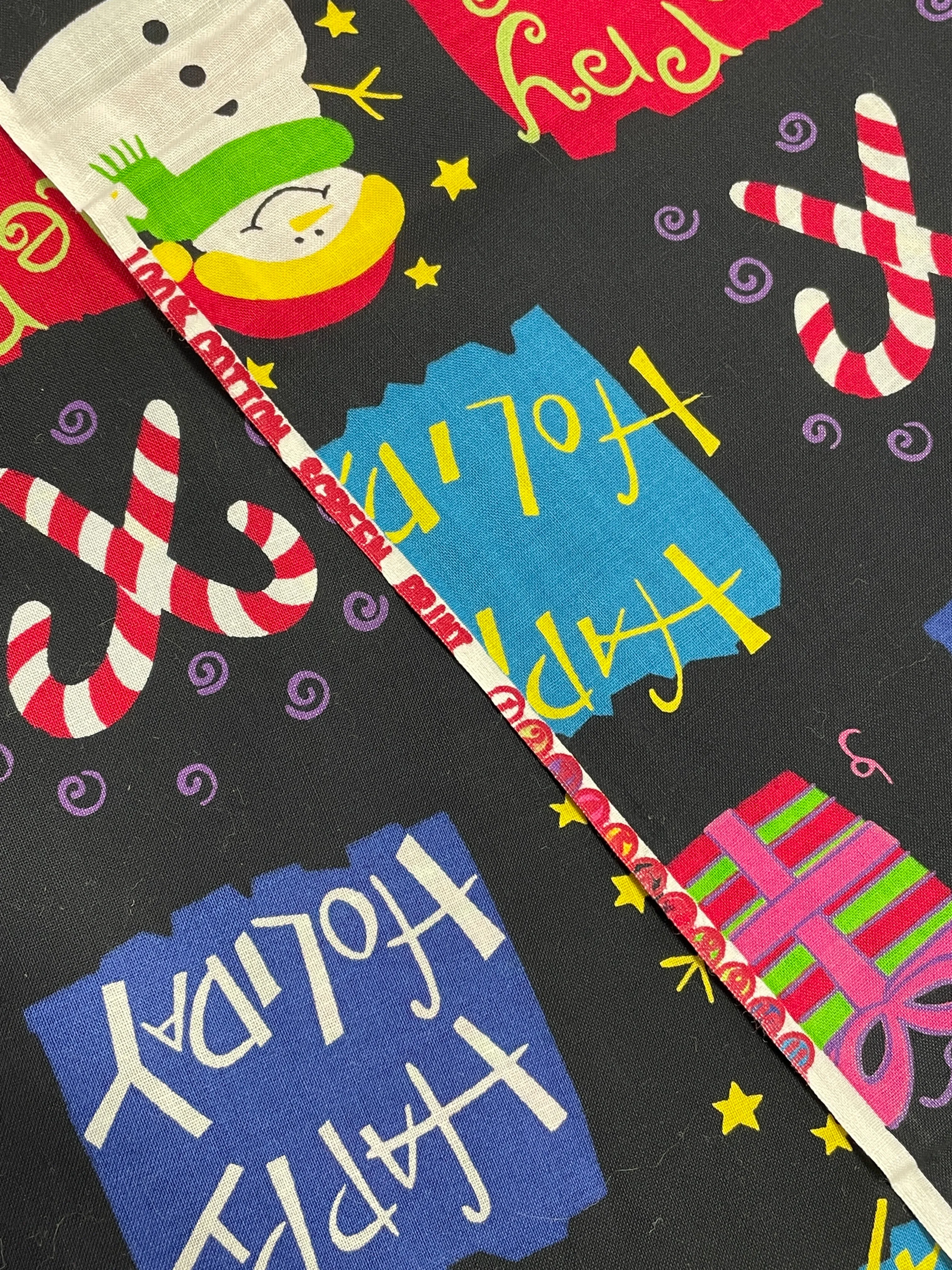 1  YD Quilting Cotton Remnant - Black with Christmas Graphics