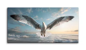 Graceful Seagull in Flight at Sunrise